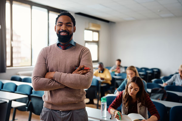 High school student standing in the front of the class