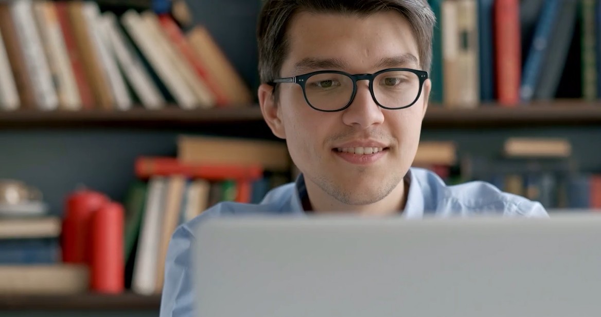 Thumbnail of man working on a computer